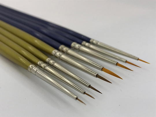 A number of paintbrushes with different colors and brush styles